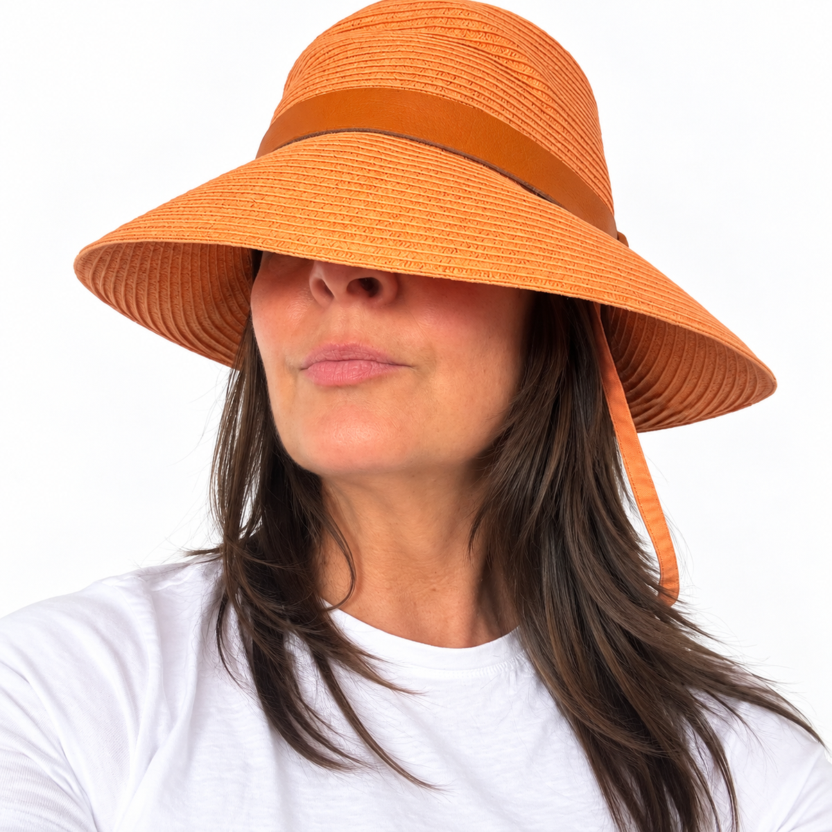 Just Cruising Feeling Peachy paper ribbon sun hat worn with the brim down for a relaxed look.