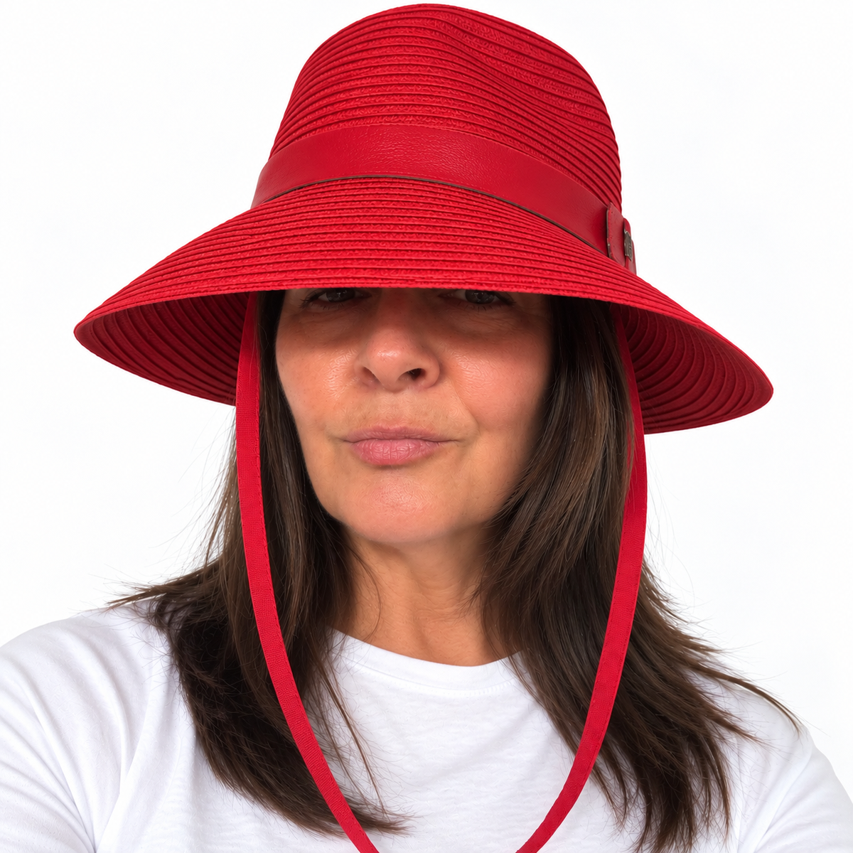 Just Cruising So Racy red sun hat worn with its adjustable grosgrain chinstrap.