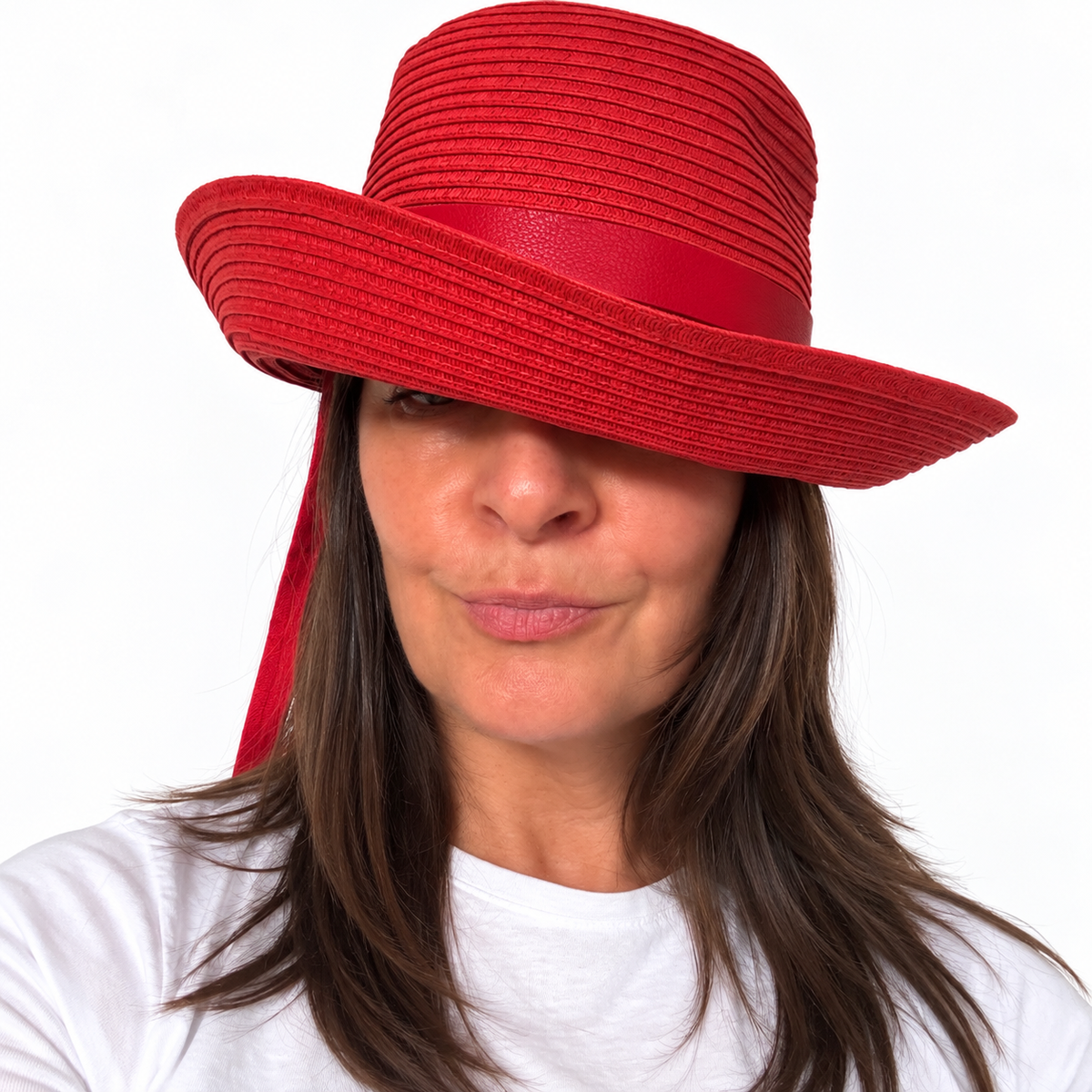 Angled view of the Just Cruising So Racy red sun hat, highlighting its relaxed brim and leather trim.