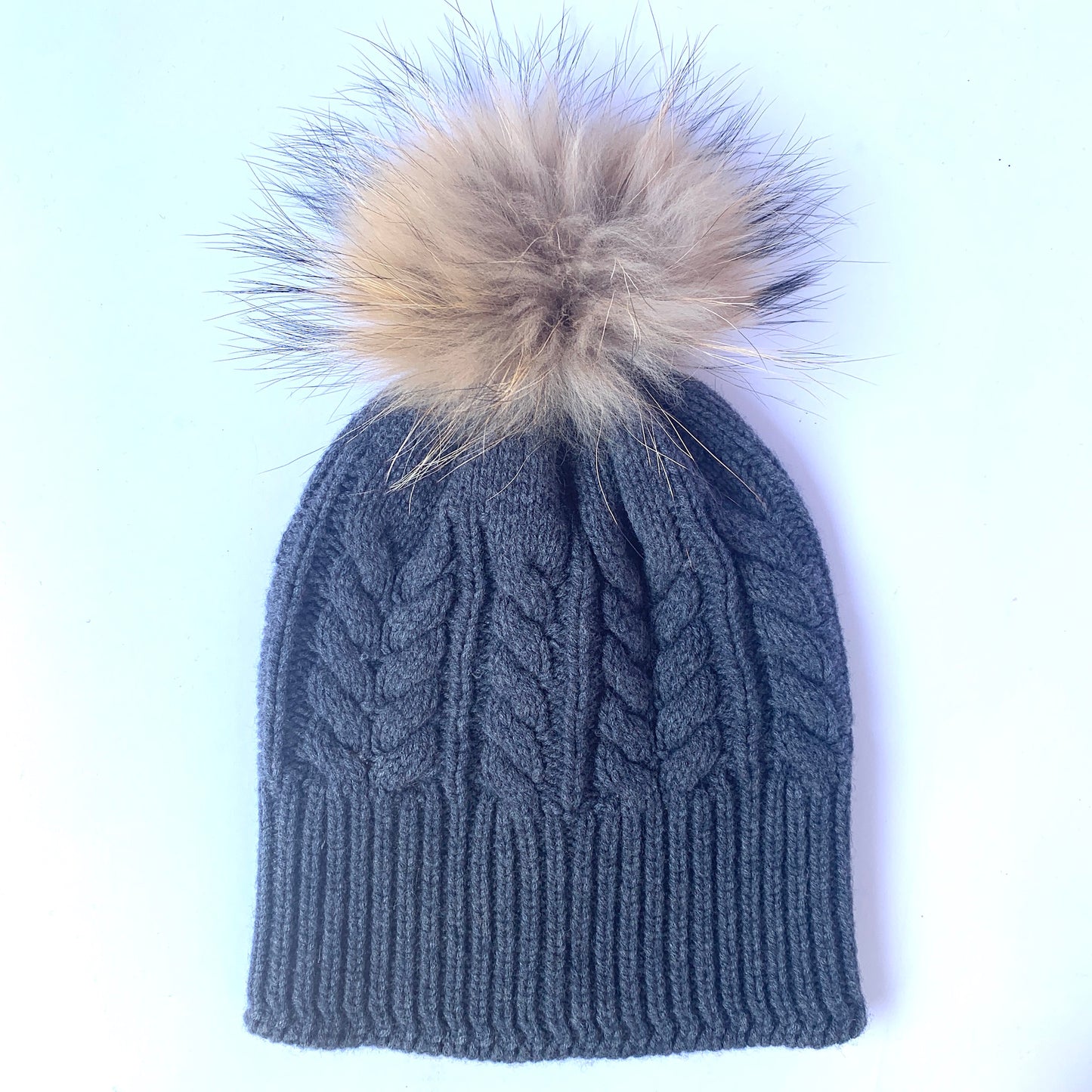 Absolutely. I'M in! 100% Pure Merino Wool Jumbo Cable Beanie with detachable Raccoon Fur Pom Pom, Pressed Metal Grey