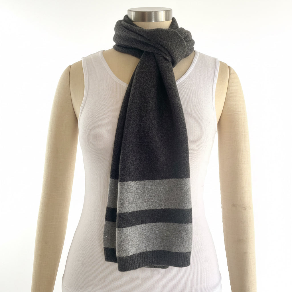 CROSS the line Pressed Metal Grey and Marle Grey pure cashmere scarf worn with a neutral outfit