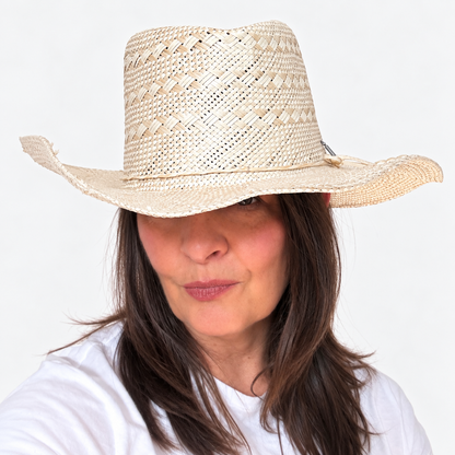 Sun-Kissed Creama woven straw hat with patterned crown and matching trim worn by woman