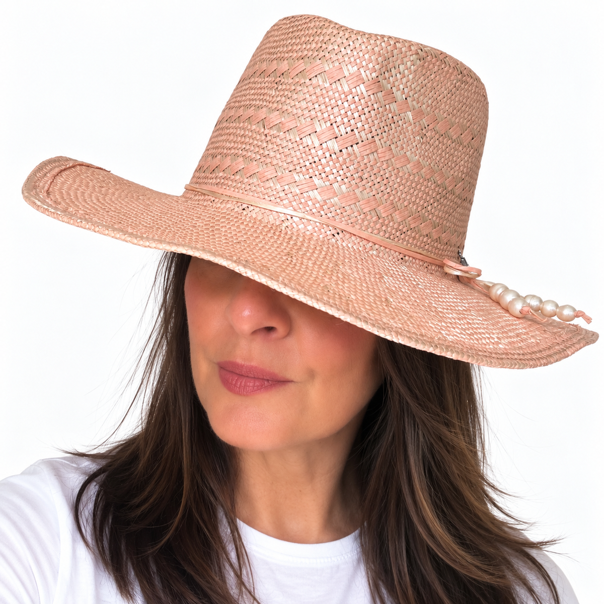 SUN-KISSED Blush woven straw hat with patterned crown and matching trim worn by woman