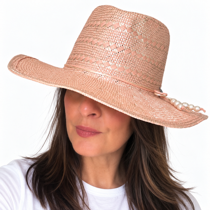 SUN-KISSED Blush woven straw hat with patterned crown and matching trim worn by woman