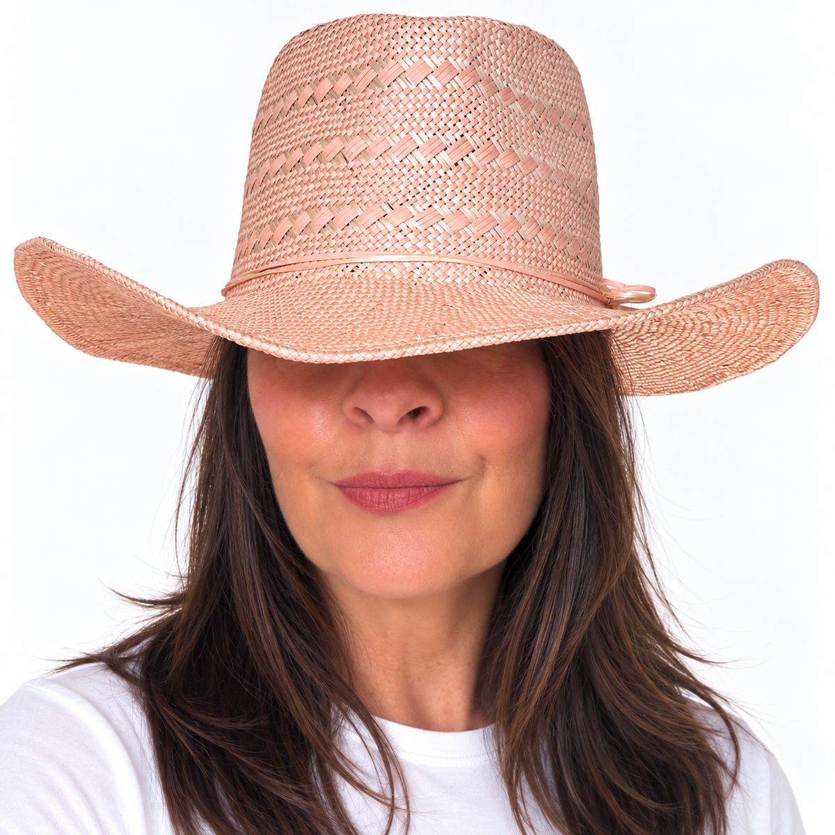SUN-KISSED Blush wide brim straw hat with pearl embellishment worn by brunette woman