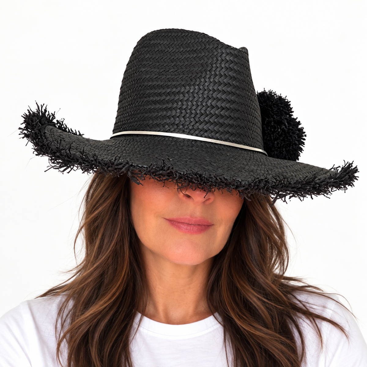 Happy on the fringe black hand woven hat with genuine leather and raffia pom pom on brunette model