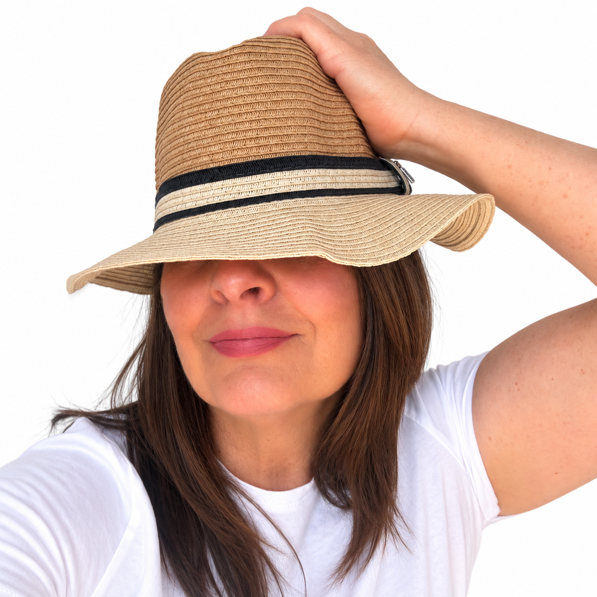 NATURALLY tan woven paper hat with black and cream band worn by brunette woman against white background