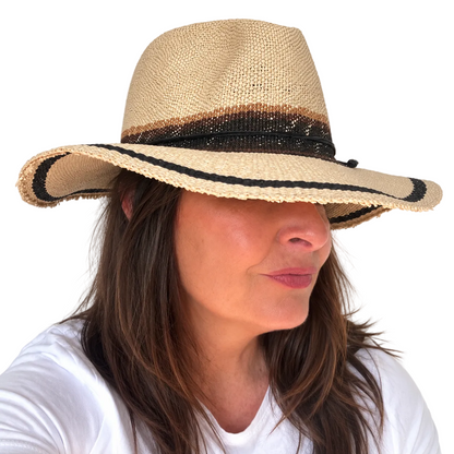 As I Am natural handwoven paper hat with black trim worn by woman, right side 