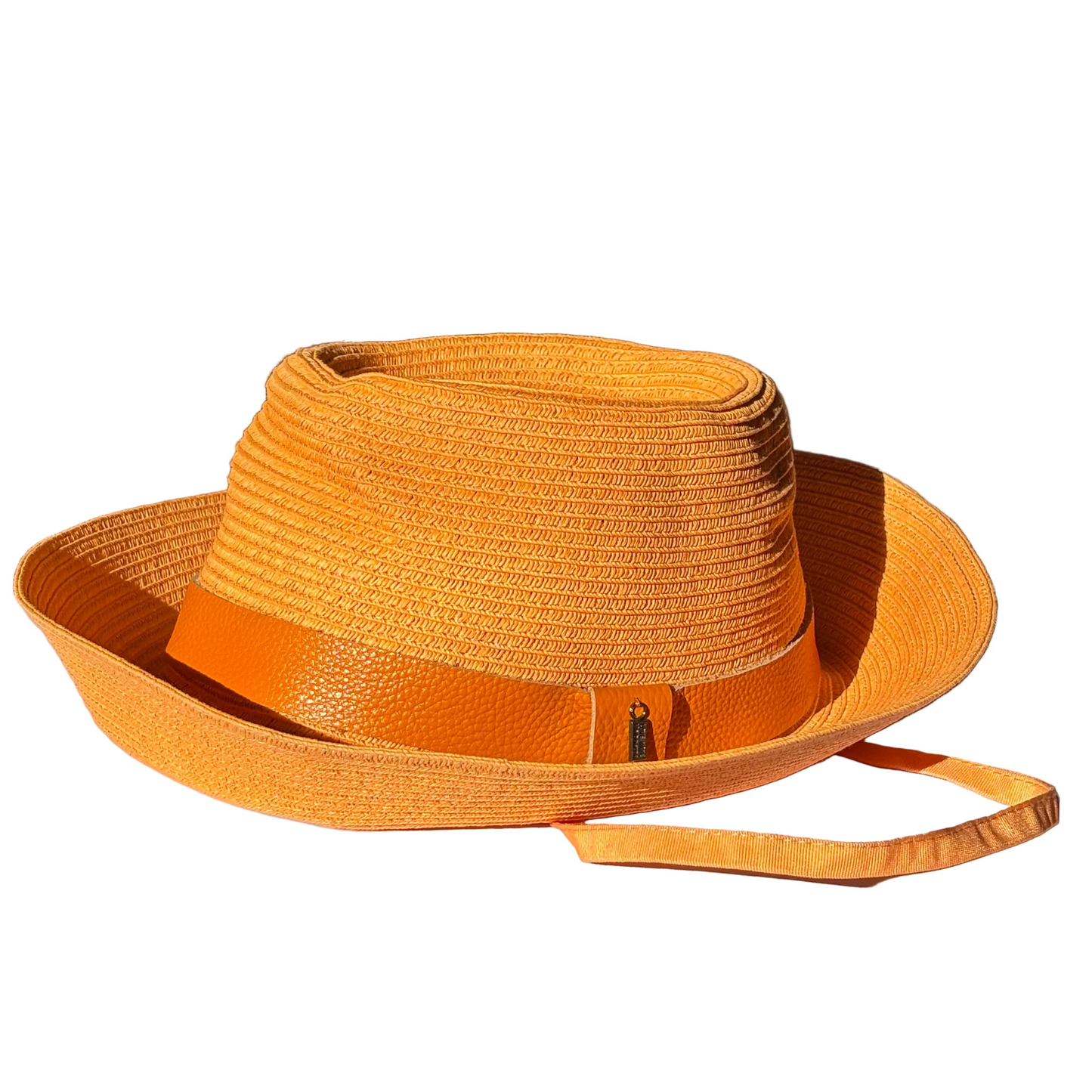 Just Cruising Feeling Peachy paper ribbon sun hat with tonal leather trim and adjustable grosgrain chinstrap.
Copy alt text