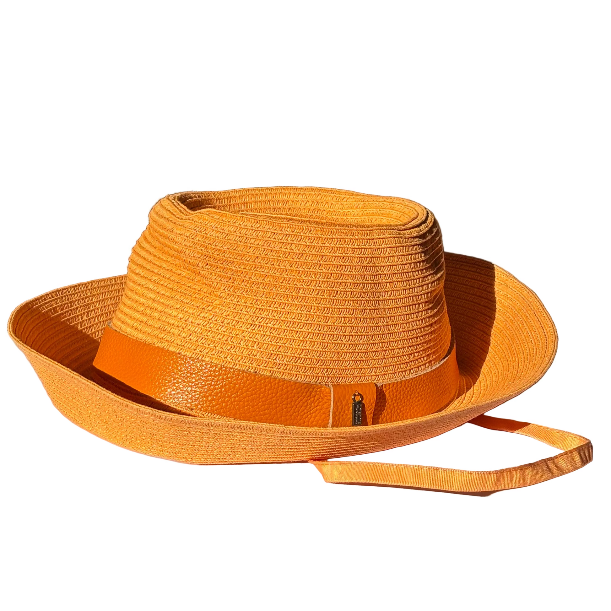 Just Cruising Feeling Peachy paper ribbon sun hat with tonal leather trim and adjustable grosgrain chinstrap.
Copy alt text