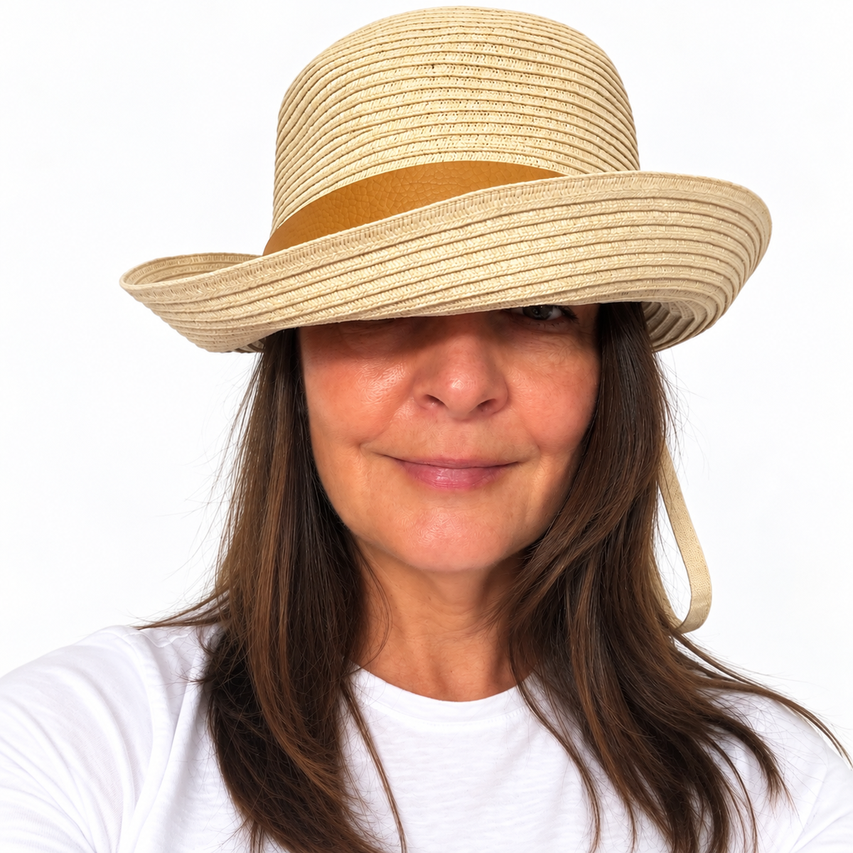 Front view of the Just Cruising Naturally paper ribbon sun hat worn with its brim shaped for everyday style.